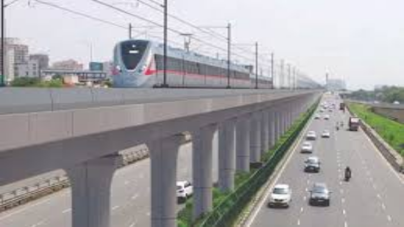 Delhi Metro Blue Line: दिल्ली में पहली बार नीचे मेट्रो और ऊपर दौड़ेगी रैपिड रेल, जानें इसकी खासियत और सार्वजनिक परिवहन से जोड़ने की कोशिश 