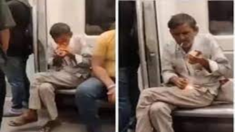 Viral Video In Delhi Metro : ‘हर फिक्र धुएं में है’ जब दिल्ली मेट्रो में शख्स ने जलाई अंधाधुंध बीड़ी, वीडियो हुआ तेजी से वायरल